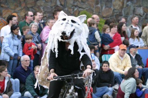 White wolf on a bike
